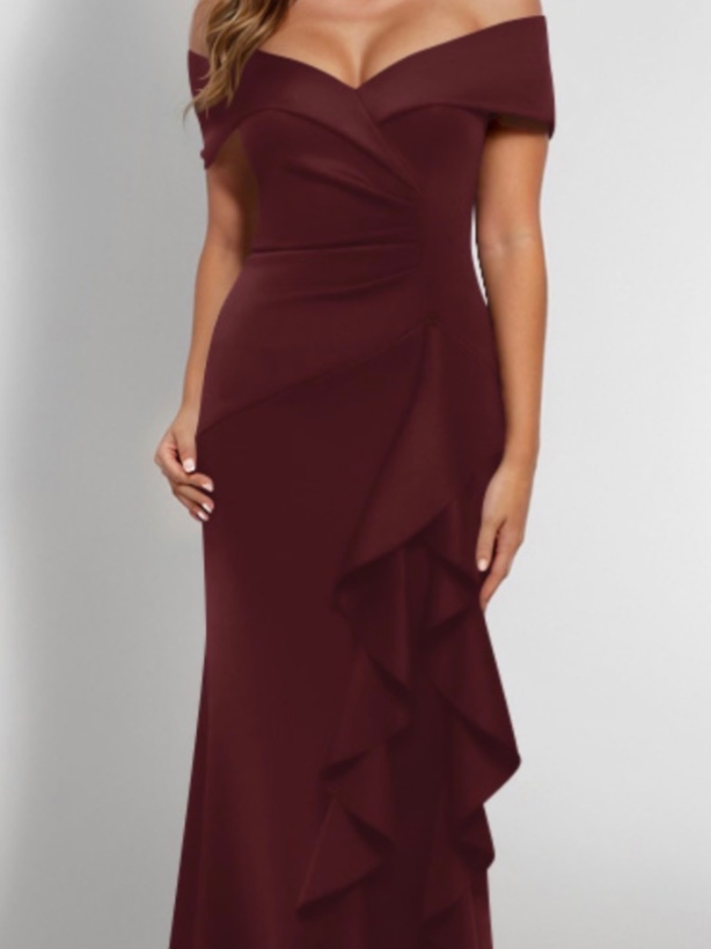 Off shoulder dress.